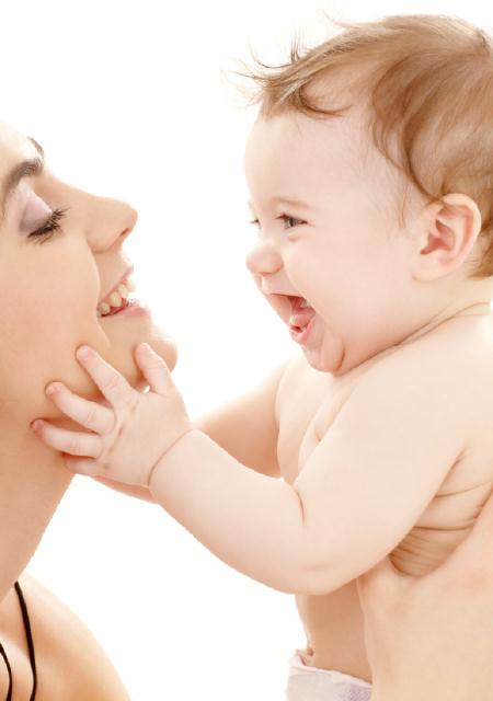 picture of happy mother with baby boy over white